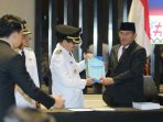 GUBERNUR LAMPUNG PIMPIN SERTIJAB PJ BUPATI LAMPUNG UTARA DENGAN BUPATI TERPILIH DR. IR. H. HAMARTONI AHADIS, M.SI., DAN ROMLI, S.KOM., S.H., M.